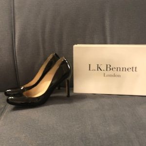 L.K. Bennett London black round toe patent leather pumps